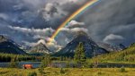 Nature___Rivers_and_lakes_Rainbow_over_the_mountain_lake_041803_.jpg