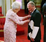 queen_elizabeth_gives_milkman_mbe.jpg