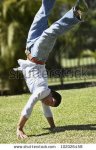 stock-photo-south-american-man-walking-on-hands-102026458.jpg