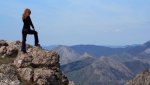 woman-standing-at-edge-of-cliff.jpg