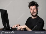 crazy-man-using-computer-stock-photo-3657161.jpg